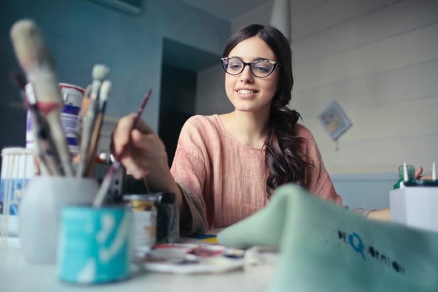 woman-happy-painting-carpet-cleaning