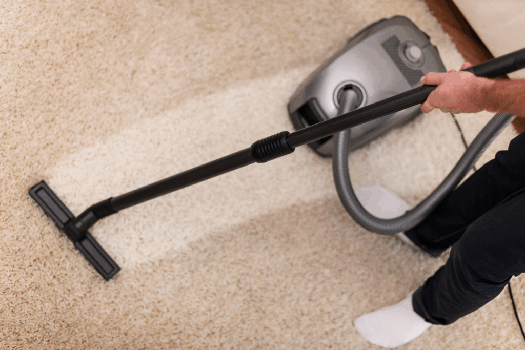 A picture of a person doing professional area rug cleaning