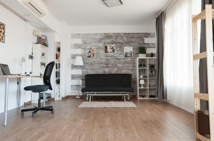 A picture of a room with laminate flooring