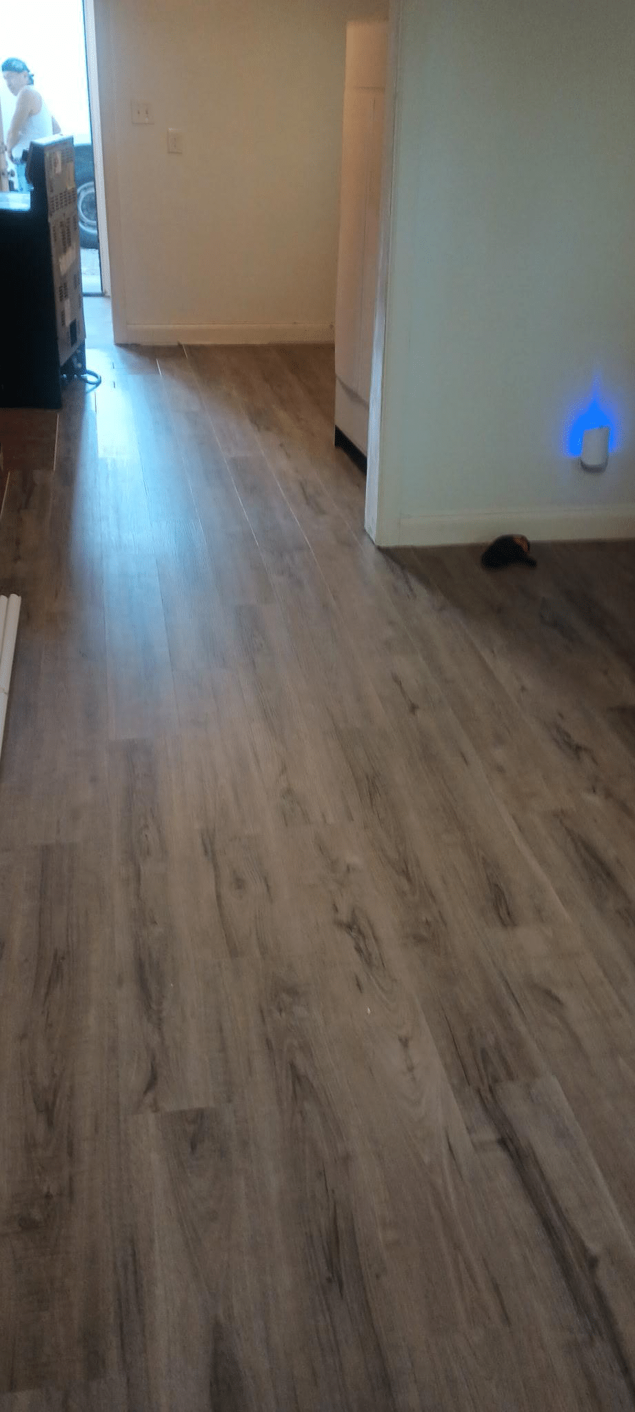 This photo shows a clean floor with hardwood on it